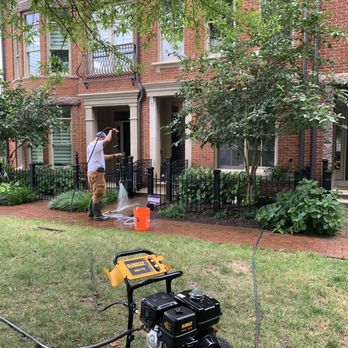 High Pro Power Washing Service - Hugo cleaning brick entrance with power hose to remove mold and stains - Pressure Washers Near Me High Pro Power Washing Service - Hugo cleaning brick entrance with power hose to remove mold and stains - Pressure Washers Near Me