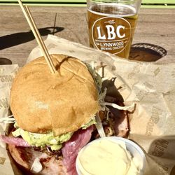 Wilson's Eatery - The kids at LBC hooking it up...again!!! Carnitas Torta & a beer!! FTW!!!