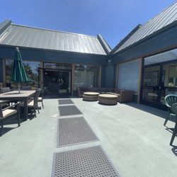 Seascape Sports Club - Patio overseeing the tennis courts, pool and playground