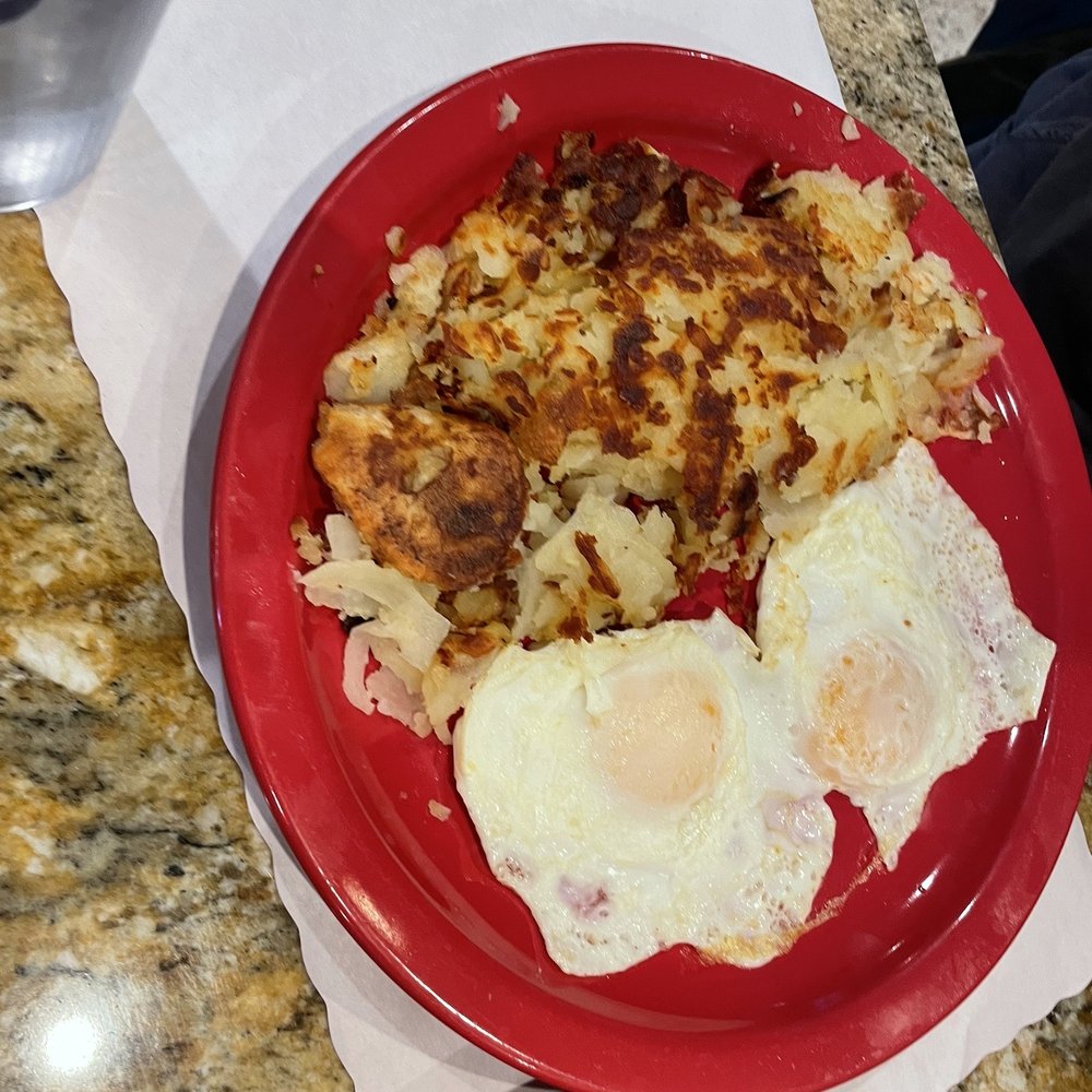 Over easy eggs and Home Fries Over easy eggs and Home Fries