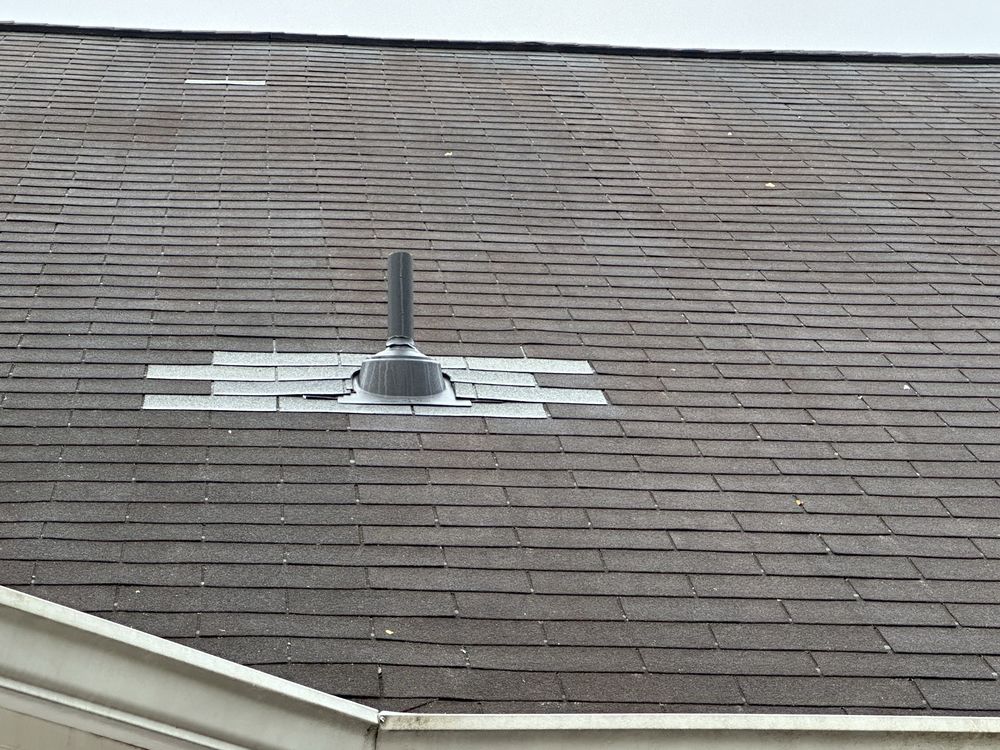 Slide of Revive Roofing Team