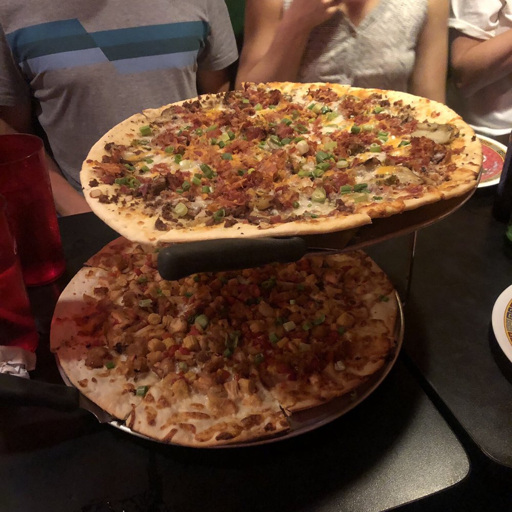 Fong's Pizza - Top= loaded potato with garlic potato, bottom = general tso's - Pizza Near Me - Des Moines, Iowa