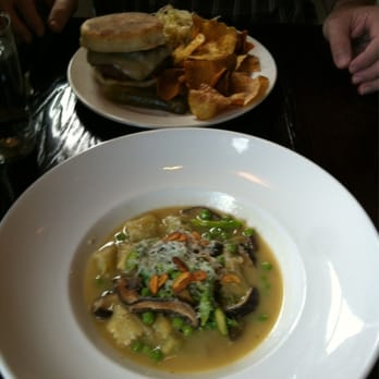 The Pullman - Grass Fed Burger w/Homemade Chips and Cider Slaw (at top of photo) and the Pea Agnolotti soup/pasta dish. Very flavorful!! - New American Near Me - Glenwood Springs, Colorado The Pullman - Grass Fed Burger w/Homemade Chips and Cider Slaw (at top of photo) and the Pea Agnolotti soup/pasta dish. Very flavorful!! - New American Near Me - Glenwood Springs, Colorado
