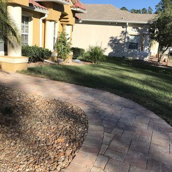 S&D Construction and Maintenance - a brick walkway in front of a house - General Contractors Near Me - Palm Coast, Florida S&D Construction and Maintenance - a brick walkway in front of a house - General Contractors Near Me - Palm Coast, Florida