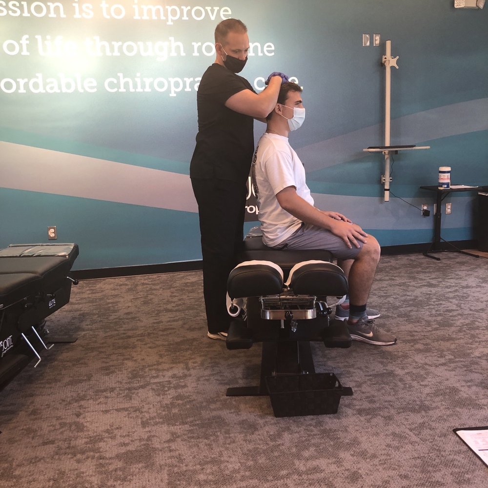 The Joint Chiropractic - Boyfriend getting adjusted! - Chiropractors Near Me - Orlando, Florida