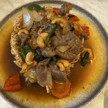 The Nine Heathrow Thai Grill & Kitchen - Bankok beef with cashew nuts - Thai Near Me - Heathrow, Florida The Nine Heathrow Thai Grill & Kitchen - Bankok beef with cashew nuts - Thai Near Me - Heathrow, Florida
