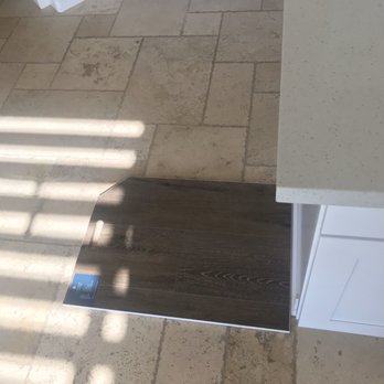 West Coast Flooring Center - Existing travertine pre-demo and installation of Innova vinyl - Flooring Near Me - Temecula, California