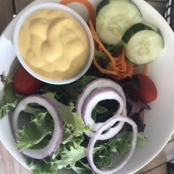 Santiago's Florida Kitchen & Craft Bar - Side salad with honey mustard dressing - Spanish Near Me - St. Augustine, Florida Santiago's Florida Kitchen & Craft Bar - Side salad with honey mustard dressing - Spanish Near Me - St. Augustine, Florida