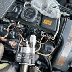 Adams Import Car Specialist - BMW 335i replacing and coding new injector