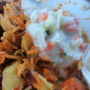 Babu Catering & Take Out - The side salad with yogurt the lamprais came with - Indian Near Me - Scarborough, Ontario