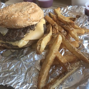 Five Guys - This is a cheeseburger with ketchup, grilled onions, grilled jalapenos and hot sauce. - Burgers Near Me - Lawton, Oklahoma Five Guys - This is a cheeseburger with ketchup, grilled onions, grilled jalapenos and hot sauce. - Burgers Near Me - Lawton, Oklahoma