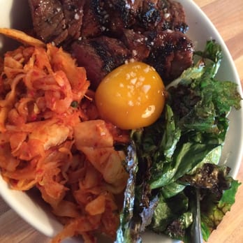 Revel - The most delicious rice -- with grilled vegetables, kim chi, egg yolk, and ribs. Amazing. - Korean Near Me - Seattle, Washington