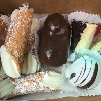 Maria Italian Bakery - Mini cannolis, eclair, black forest cake, and rum cake ball. - Bakeries Near Me - Saddle Brook, New Jersey Maria Italian Bakery - Mini cannolis, eclair, black forest cake, and rum cake ball. - Bakeries Near Me - Saddle Brook, New Jersey