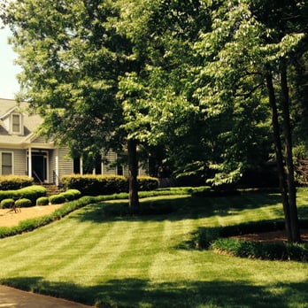 Sunbelt Lawn Care - a house in the background - Landscaping Near Me Sunbelt Lawn Care - a house in the background - Landscaping Near Me