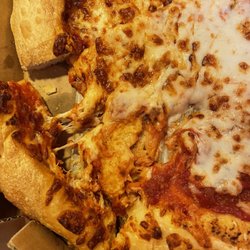 Pizza Hut - Pizza showed up mangled.