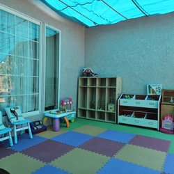 Our large outdoor covered play area - we also have an uncovered yard children can play in!
