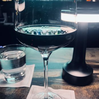 Moxie Steak House - Glass of red, awaiting the steak course. - Steakhouses Near Me - Alameda, California Moxie Steak House - Glass of red, awaiting the steak course. - Steakhouses Near Me - Alameda, California
