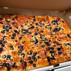 The Great Canadian Pizza Company - Olive and prosciutto pizza