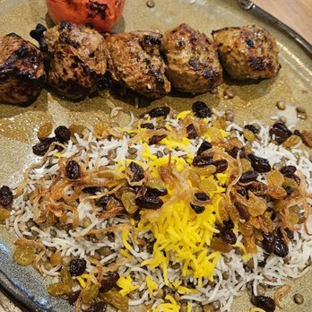 Rumi's Kitchen - Colony Square - Lamb kabobs with rice - Persian/Iranian Near Me - Atlanta, Georgia Rumi's Kitchen - Colony Square - Lamb kabobs with rice - Persian/Iranian Near Me - Atlanta, Georgia