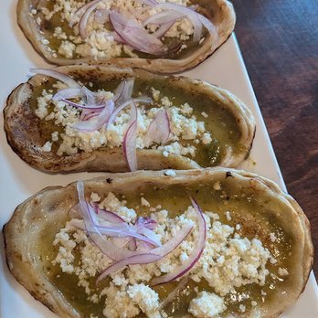 Maizal Mexican Kitchen - Memelitas, traditional Oaxaca snack. Toasted corn cakes topped with salsa verde, red onion and queso fresco. - Mexican Near Me - East Amherst, New York