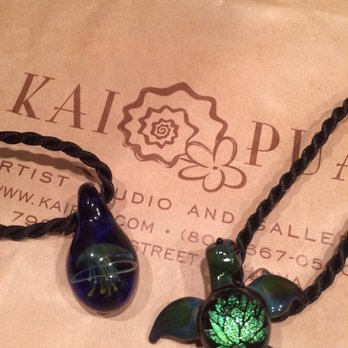 Kai Pua - Jellyfish pendant $49, turtle with lotus pendant $64. Guaranteed durable glass - Art Galleries Near Me - Lahaina, Hawaii