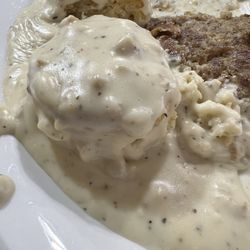 Carol's Kitchen - Sausage biscuits and gravy, they make the gravy patties themselves it appears, and then the pieces are mixed into the gravy
