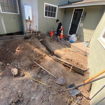 Pro West Electrical - Installing underground wiring pipework for a tankless water heater - Electricians Near Me - Tustin, California Pro West Electrical - Installing underground wiring pipework for a tankless water heater - Electricians Near Me - Tustin, California