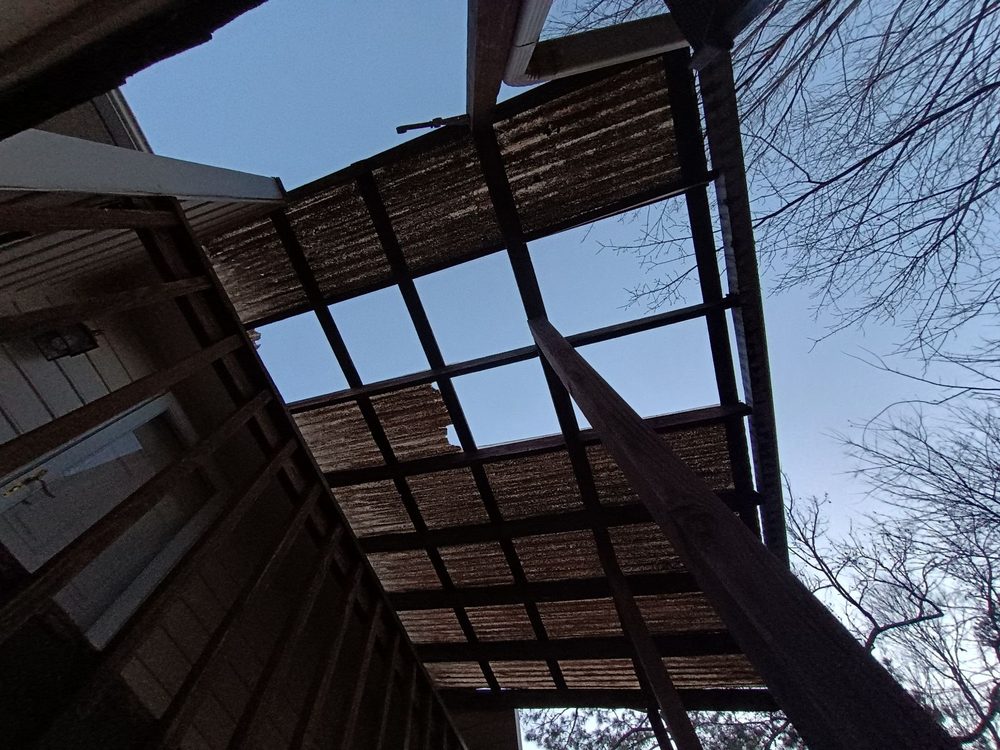 Slide of Benitez Roofing