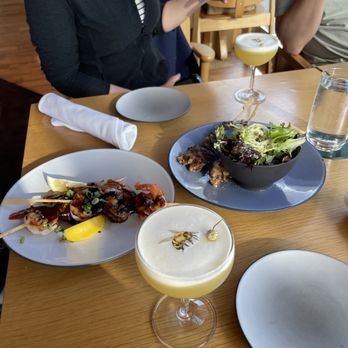 Charlotte Restaurant & Lounge - A Buzzed Bee In The Baijiu cocktail, beef and shrimp skewers - New American Near Me - Seattle, Washington