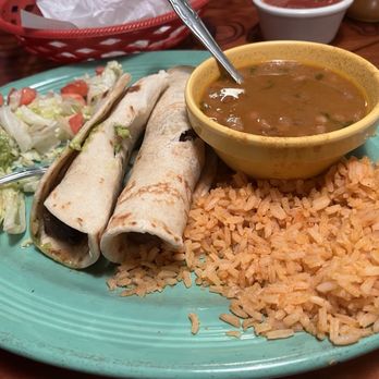 Guadalajara Mexican Restaurant - 2 Beef tacos with homemade flour tortillas, charro beans, and rice. - Mexican Near Me - Bastrop, Texas