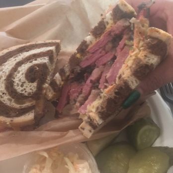 Dingfelder's Delicatessen - Marbled rye pastrami sandwich and side of latkes - Delis Near Me - Seattle, Washington Dingfelder's Delicatessen - Marbled rye pastrami sandwich and side of latkes - Delis Near Me - Seattle, Washington