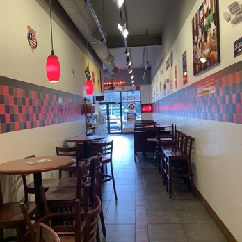 Jimmy John's - View of seating area -tables with alternate seating - Sandwiches Near Me - Vestal, New York Jimmy John's - View of seating area -tables with alternate seating - Sandwiches Near Me - Vestal, New York