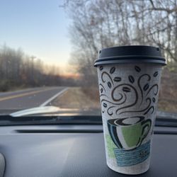 Twin Ports Express - Mocha Latte in their to-go cup