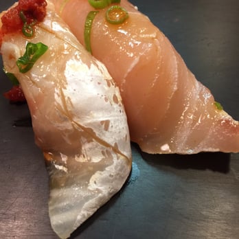 Izumi - Thai Snapper (left) Striped mahi. No soy sauce needed. The chef applied ponzu sauce. - Sushi Bars Near Me - Kirkland, Washington Izumi - Thai Snapper (left) Striped mahi. No soy sauce needed. The chef applied ponzu sauce. - Sushi Bars Near Me - Kirkland, Washington