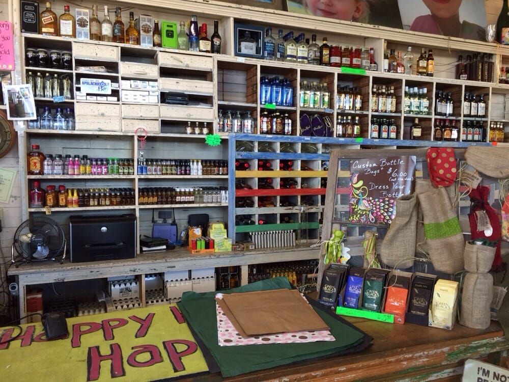 Honey Hole Liquors Logo