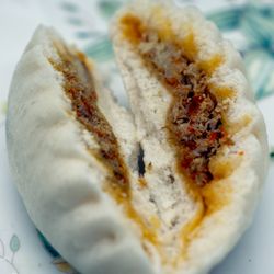 Xiebao Crabhouse - Crab Roe Willow Leaf Bun 纯蟹黄柳叶包: $3.75 ($4.08 with tax) for one; take-out, cut in half