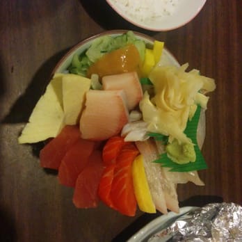 Maneki - Sashimi bowl. We counted 7 types of fish/shellfish and veggies in addition to the rice. Great value at $18! - Japanese Near Me - Seattle, Washington Maneki - Sashimi bowl. We counted 7 types of fish/shellfish and veggies in addition to the rice. Great value at $18! - Japanese Near Me - Seattle, Washington