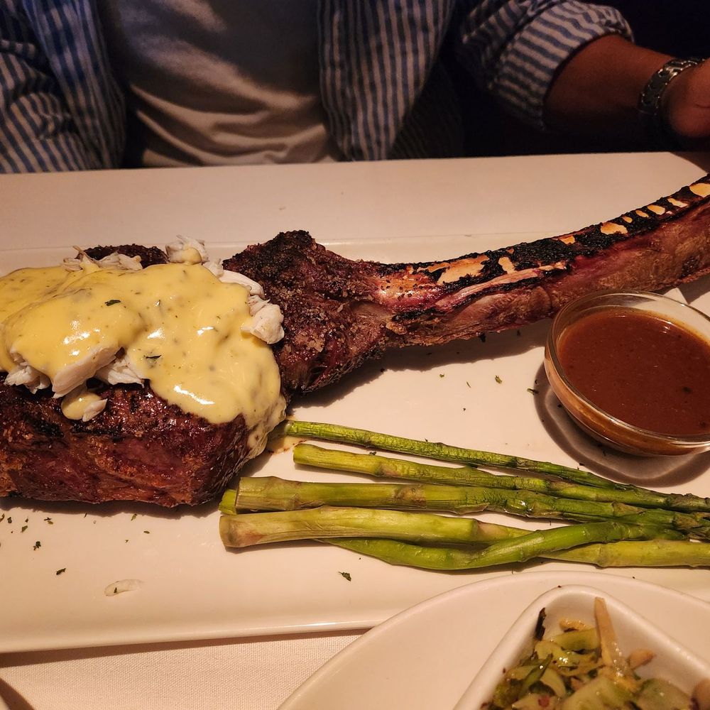 Sullivan's Steakhouse - Tomahawk Dry Aged Ribeye Oscar Style - Steakhouses Near Me - Leawood, Kansas Sullivan's Steakhouse - Tomahawk Dry Aged Ribeye Oscar Style - Steakhouses Near Me - Leawood, Kansas