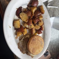 Denny's Pantry - Breakfast sandwich with home fries.