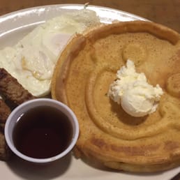 Eggs, sausage and waffle... zoom Into the egg and you'll see a complimentary hair cooked in from the kitchen staff (disgusting)!