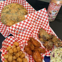 Wingz combo (tots, dirty buffalo, garlic Parmesan) with coleslaw / Garlic pull apart bread Wingz combo (tots, dirty buffalo, garlic Parmesan) with coleslaw / Garlic pull apart bread
