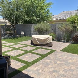 Backyard turf and pavers.