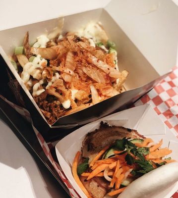 Photo of Banh Mi Boys - Toronto, ON, CA. Kimchi Fries and Five Spice Pork Belly Steamed Bao