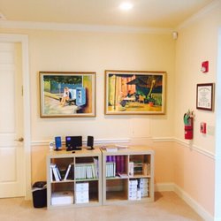 Jeffrey Dach, MD - Waiting room with his literature,  I actually took these photos because I liked his paintings.