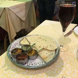 Indian Star - Free appetizer - dry/crispy bread with various pickles & chutneys