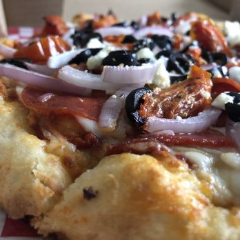 Humdinger Pizza - Look at that beautiful crust. Ample cheese right up to the edge. Toppings piled on but crust still crisp underneath. - Pizza Near Me - Portland, Oregon