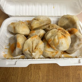 Jin Mei Dumpling - Pork buns with soy and siracha sauces - Chinese Near Me - New York, New York Jin Mei Dumpling - Pork buns with soy and siracha sauces - Chinese Near Me - New York, New York