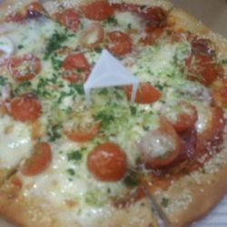 Boston Pizza - Thin crust with sesame seeds and lime juice.