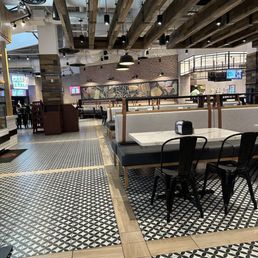 The area that's supposed to be restaurants, empty except for a bartender at 1 pm on a Saturday afternoon.