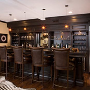 Oneida Builders - a home bar with a zebra rug - General Contractors Near Me - Atlanta, Georgia